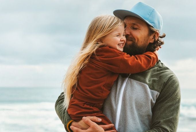 Father and daughter at the beach